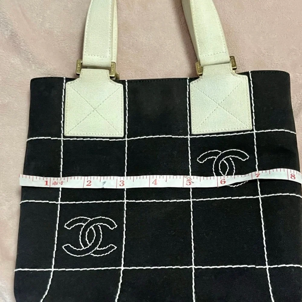 CHANEL Black Tote with Cream Handles and Grid Stitching